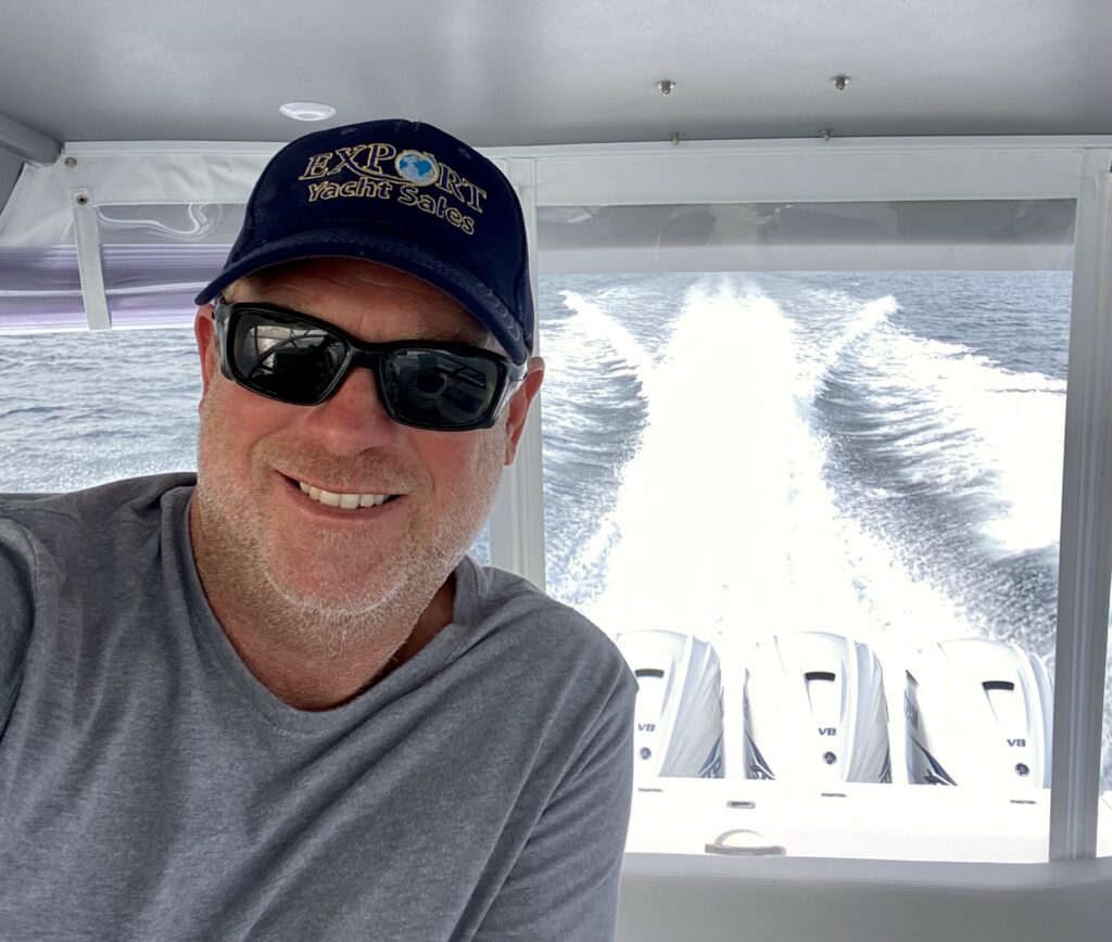 closeup shot of a man in a boat clicking selfie